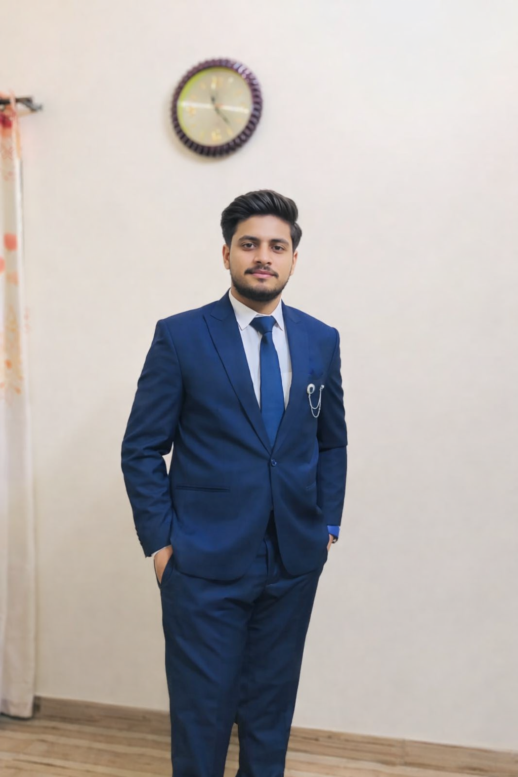 Murtaza Ahmad, a Student at Hamdard University, specializing in digital systems & Web Technology, Posing Professionally with a confident expression in a simple background.